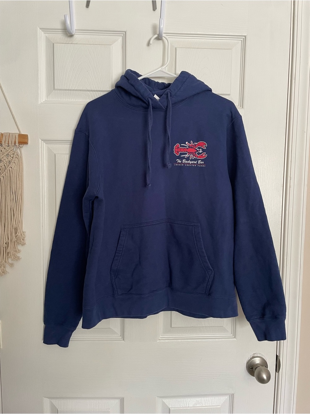 The Backyard Bar Navy Hooded Pullover Sweatshirt with Red Lobster Graphic